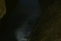 An opening in the middle of the cave. Do you see the face?